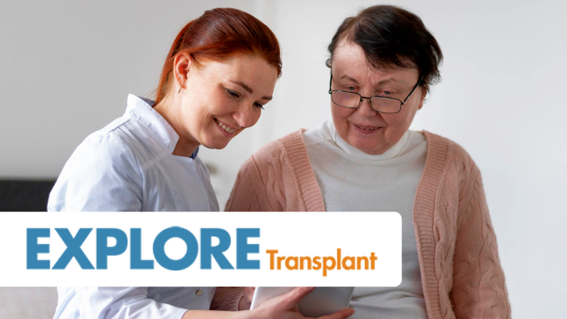 Two individuals seated indoors, one wearing a white coat and holding a tablet, showing it to the other person, accompanied by a text reading “EXPLORE Transplant."