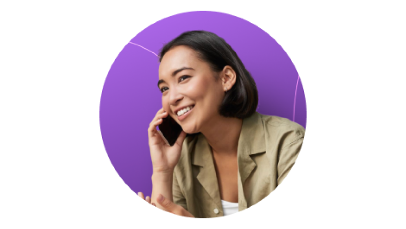 A woman with short hair wearing a beige coat, talking on a mobile phone, with a purple circular background.
